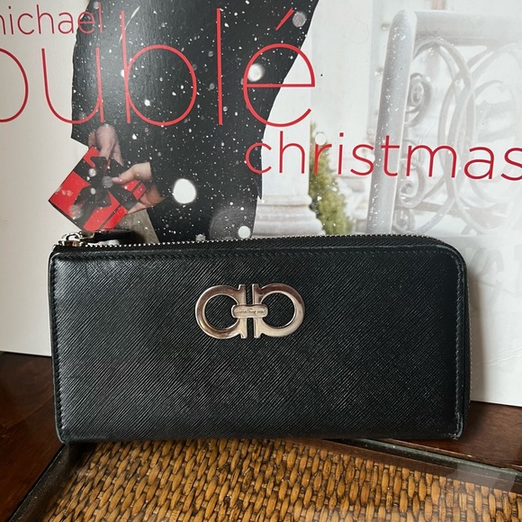 Salvatore Ferragamo Handbags - Authentic Salvatore Ferragamo Saffiano Leather Black Women's Zippy Wallet EUC!